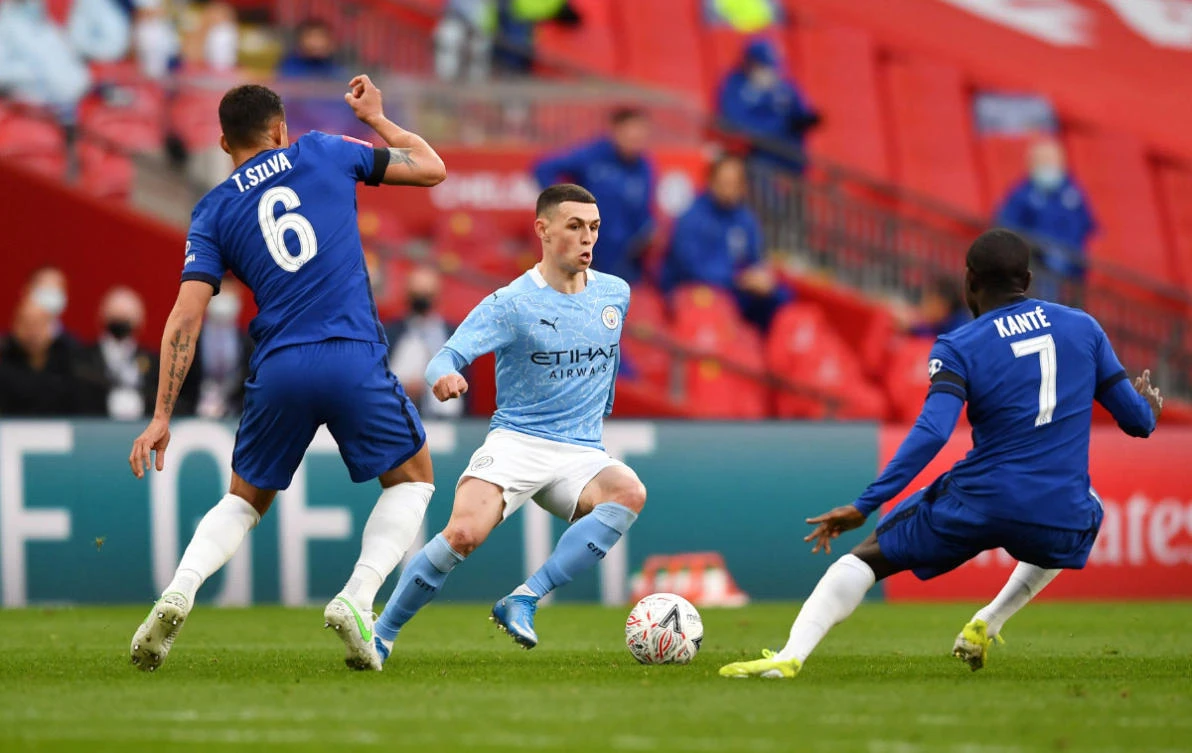 Manchester City's Phil Foden in action during their FA Cup Semi Final match with Chelsea at the Wembley Stadium in London on April 17, 2021. (Pool via REUTERS/Ben Stansall/File Photo)
