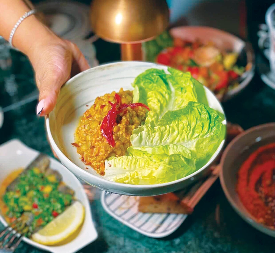 Baby gem lettuce and mujadara were given the butter treatment to add taste, color and consistency.