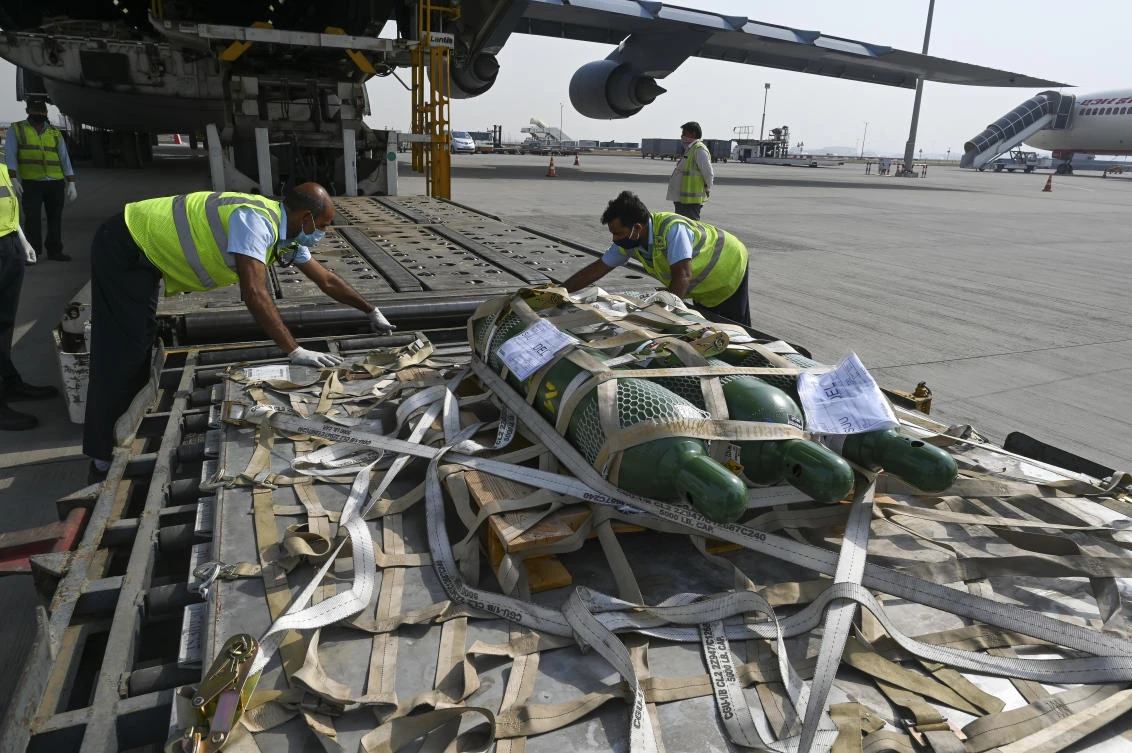 In this April 30, 2021, file photo, relief supplies from the United States in the wake of India’s COVID-19 situation arrive at the Indira Gandhi International Airport cargo terminal in New Delhi, India. (File/AP)