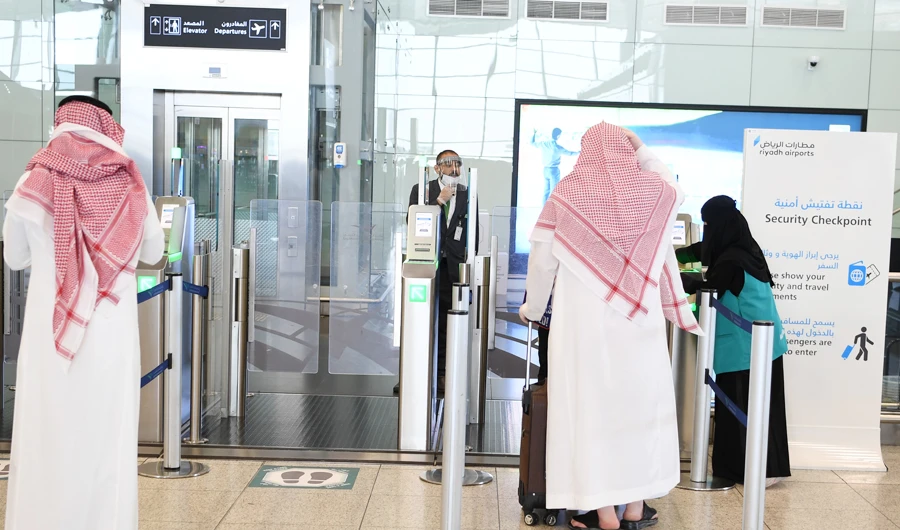 Travelers will not be allowed into airports or planes without showing their health statuses through the government-approved health app, Tawakkalna. (Supplied)