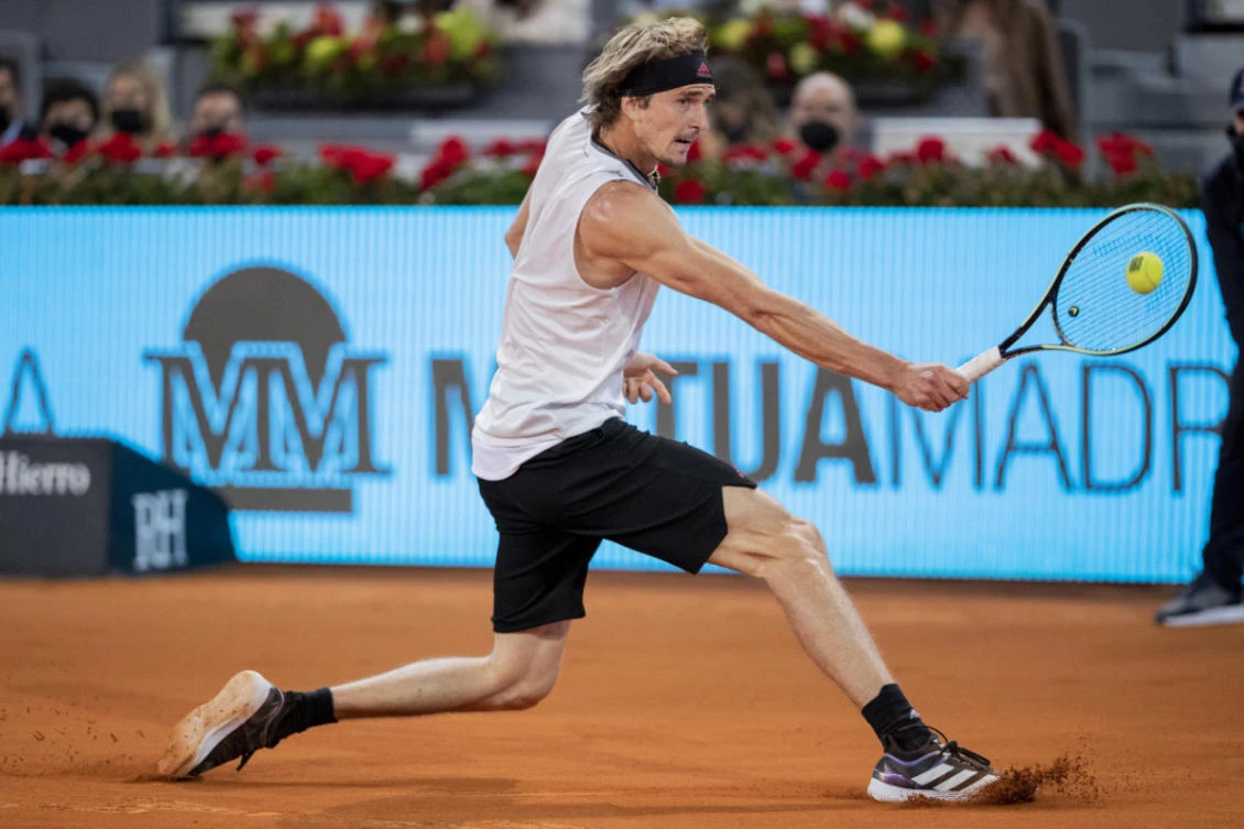 Germany's Alexander Zverev returns the ball to Italy's Matteo Berrettini during the men's final match at the Mutua Madrid Open tennis tournament in Madrid on May 9, 2021. (AP Photo/Bernat Armangue)