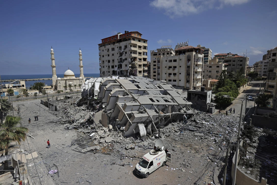 Israel destroys tower block, kills Hamas commander as Gaza civilian death toll mounts