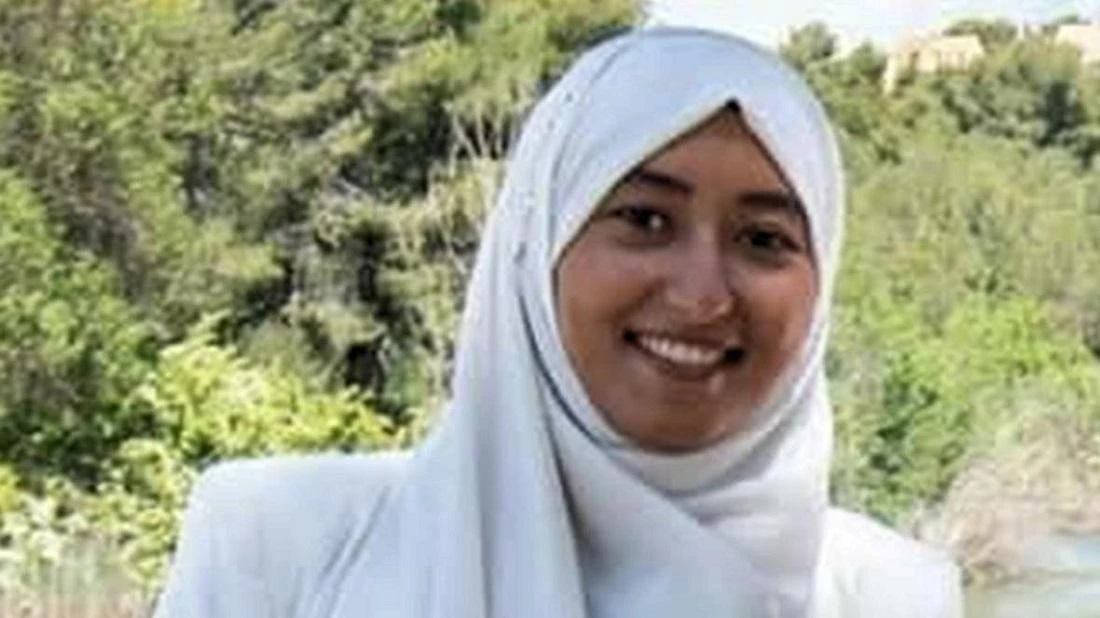 Macron’s party pulls support from woman in Muslim headscarf