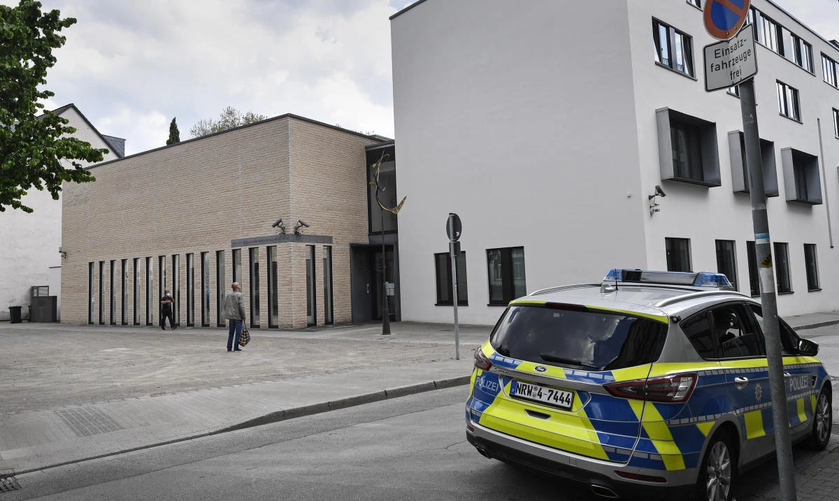 A police car before the synagogue in Gelsenkirchen, Germany whose leading Jewish group has sharply condemned protests in front of the synagogue as "pure antisemitism." (AP)