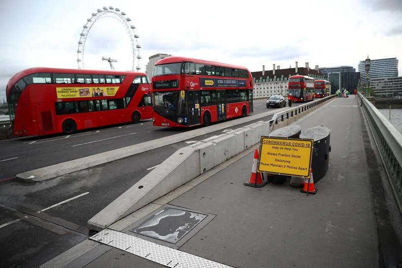 A sign reminding people about social distancing is seen on Westminster bridge, as the outbreak of the coronavirus disease (COVID-19) continues, in London, Britain, June 19, 2020. (Reuters)