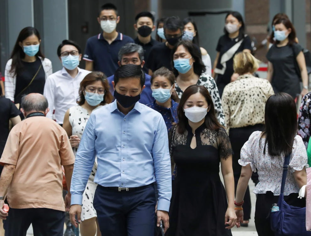 Vaccinated should still mask up in high Covid areas: WHO