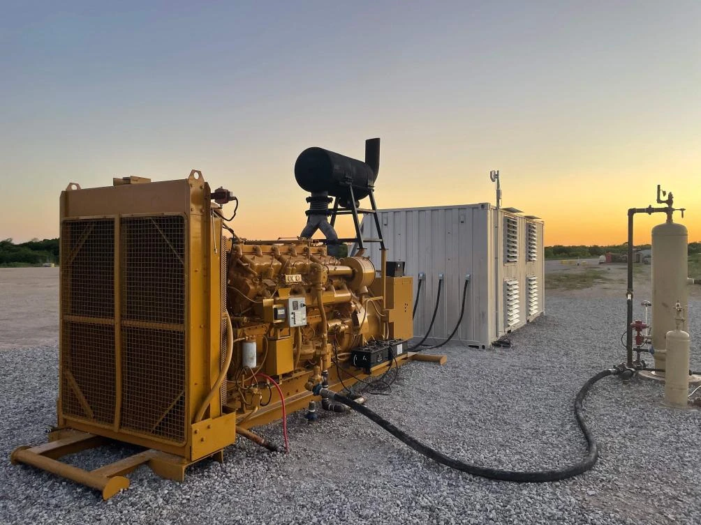 A natural gas generator powering a bitcoin mining data center on an oil field in North Texas. (AFP)