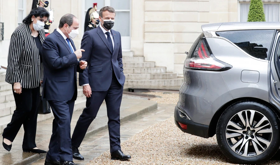 French President Emmanuel Macron , right, listens to Egyptian President Abdel Fattah el-Sissi after their talks at the Elysee Palace, Monday, May 17, 2021 in Paris. (AP)