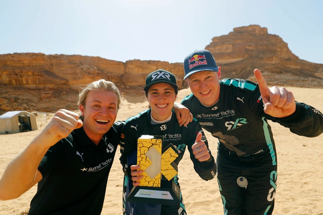Nico Rosberg, founder and CEO of Rosberg X Racing, celebrates winning the Desert X Prix in AlUla with drivers Molly Taylor and Johan Kristoffersson. (Sam Bloxham/LAT Images)