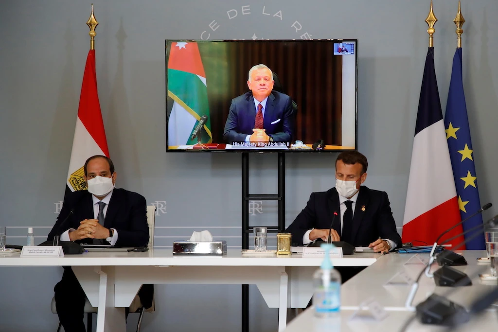 Macron and Sisi attend video conference with King Abdullah II to work on a proposal for a ceasefire between Israel and the Palestinians at the Elysee Palace in Paris, France, May 18, 2021. (Reuters)