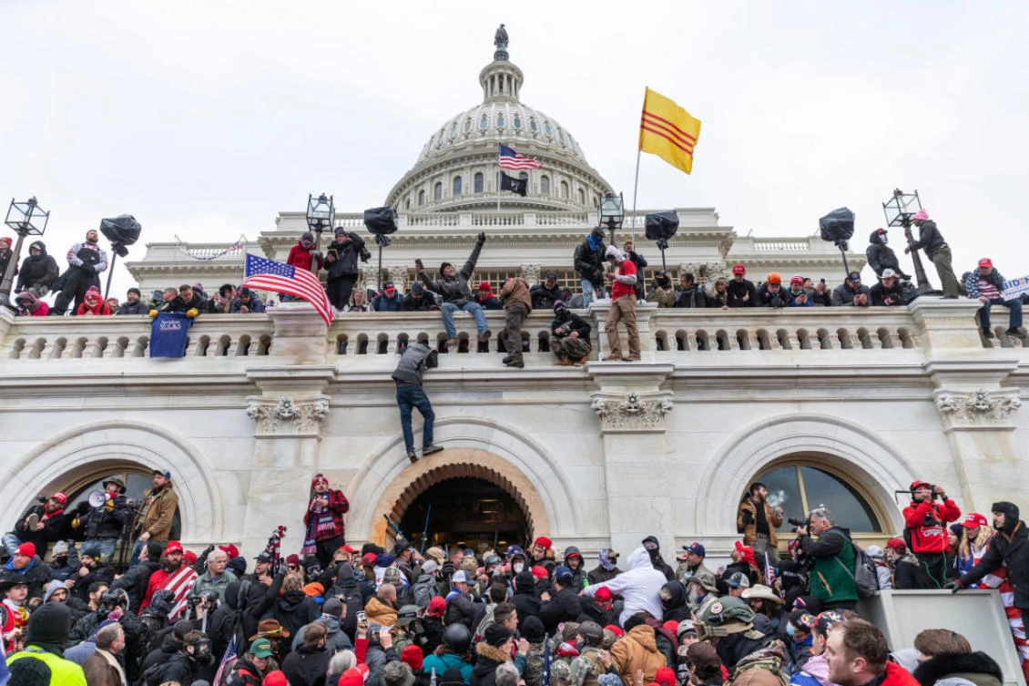 Protesters seen all over Capitol building where pro-Trump supporters riot and breached the Capitol on January 6, 2021. (Shutterstock)