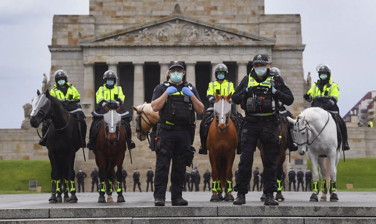 In this September 12, 2020 photo, Australian police stands guard in front of the Shrine of Remembrance during an anti-lockdown rally in Melbourne. (AFP)