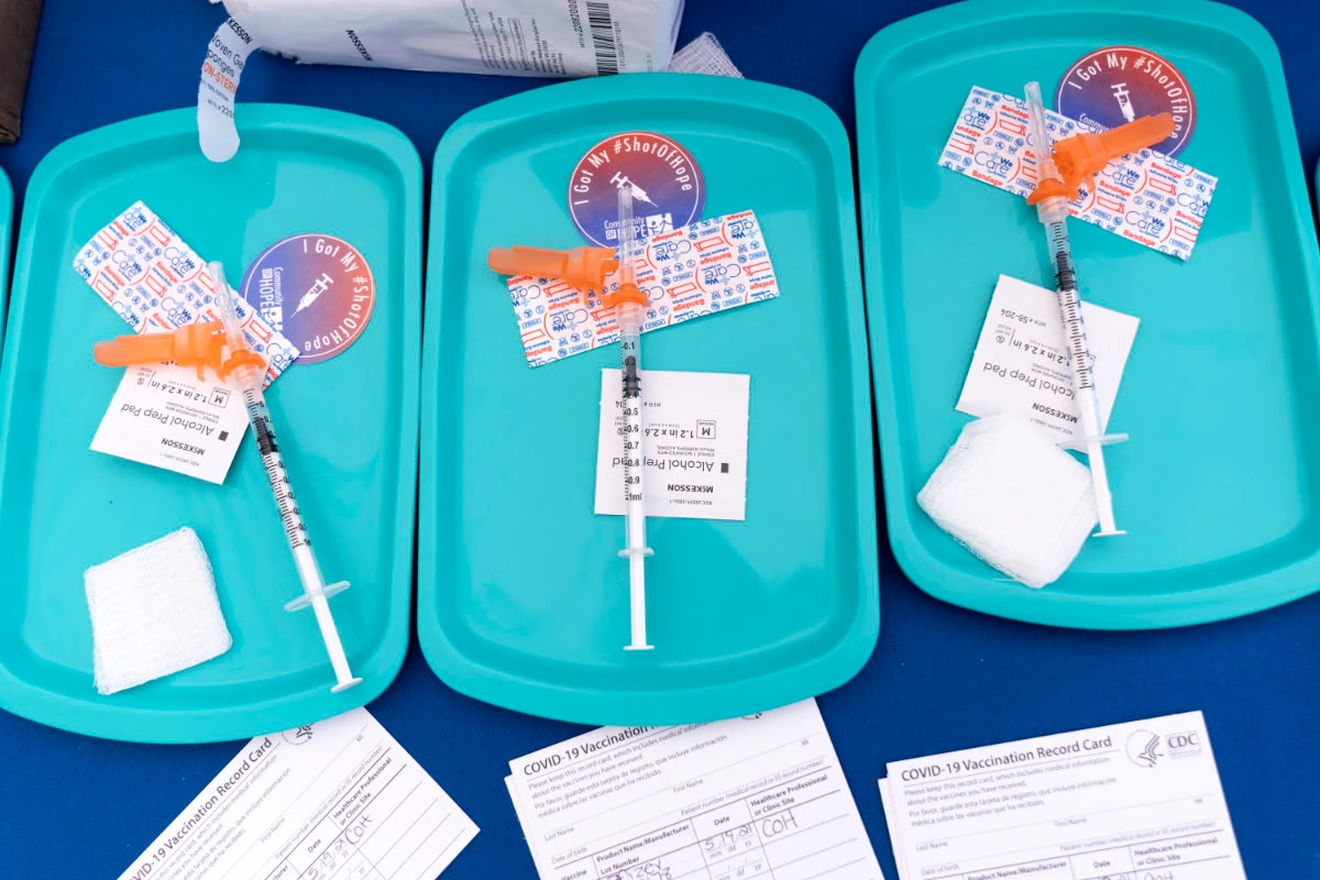 Pfizer COVID-19 vaccine doses are prepared for members of the community 12 years and up, on May 19, 2021, at a clinic held by Community of Hope in southeast Washington. (AP Photo)