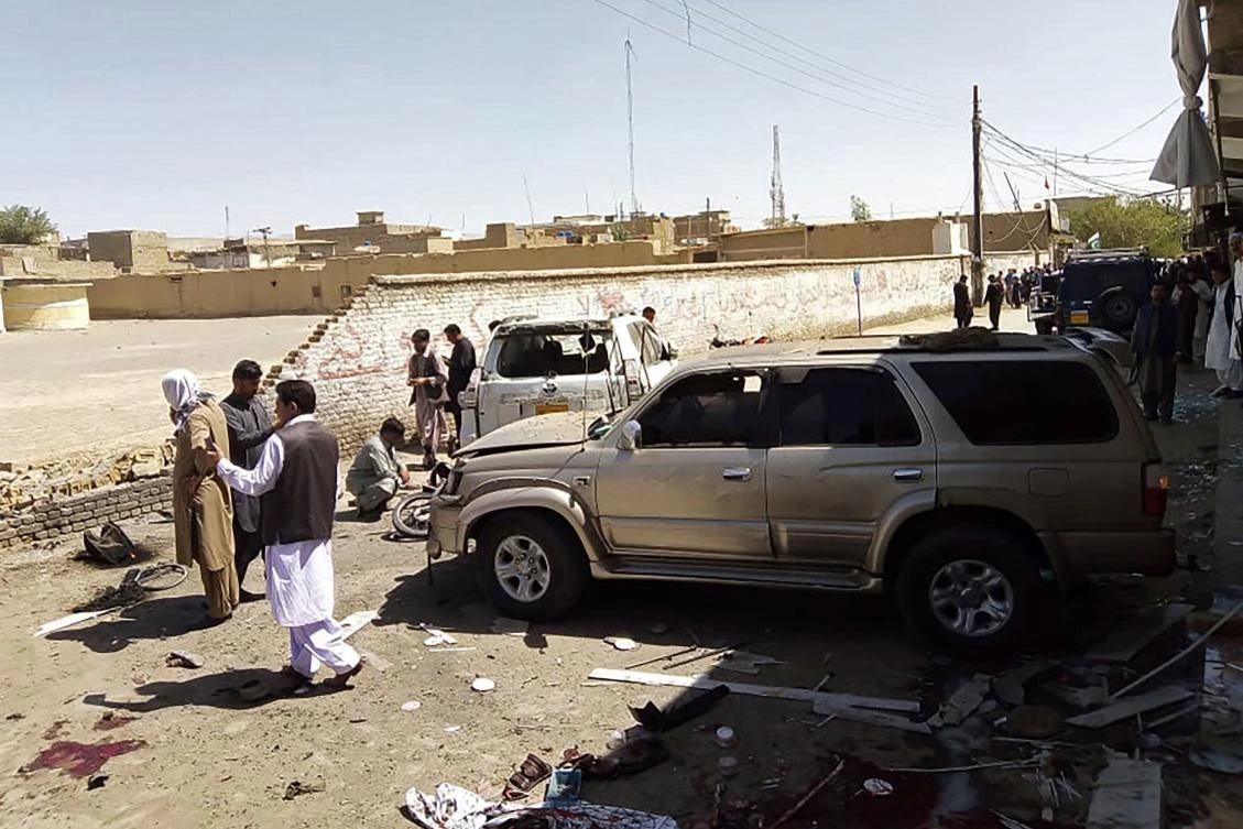 Security officials examine the site of a bomb blast during a pro-Palestinian rally in which six people were killed and another 14 wounded, in Chaman of Pakistan’s Balochistan province. (AFP)