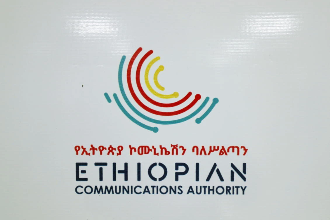 Ethiopian Communications Authority logo is seen on a billboard during a bid opening ceremony in Addis Ababa. (Reuters)