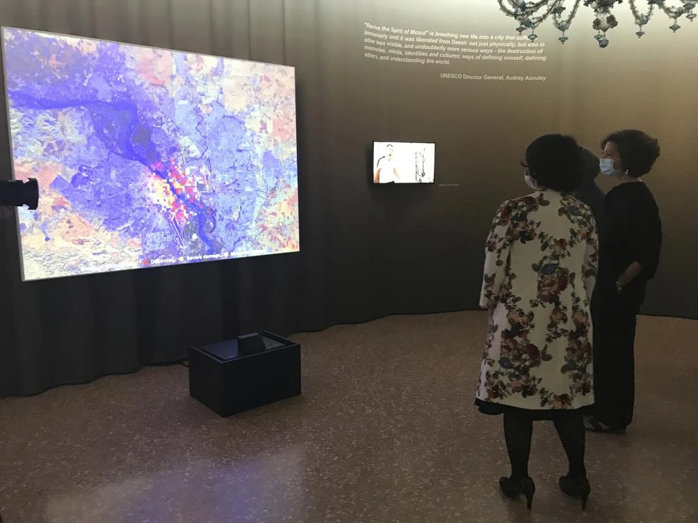 Audrey Azoulay, UNESCO's director general, right, attends the exhibition " Revive the Spirit of Mosul ", in Venice, Italy Friday, May 21, 2021. (AP)