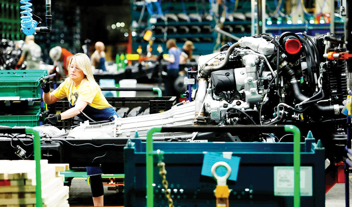According to IHS Markit, backlogs of work accumulated early this month at the fastest pace in 14 years. Its measure of new orders increased. The pace of hiring in factories was the slowest in five months. (AFP/File)