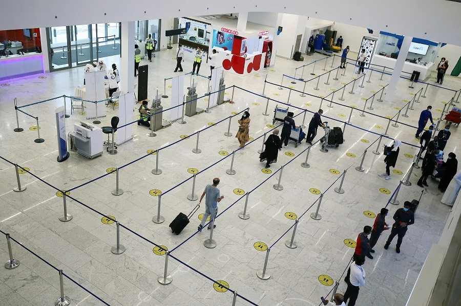 Travellers arrive at Kuwait international Airport, in Farwaniya, about 15kms south of Kuwait City, on August 1, 2020. (File/AFP)