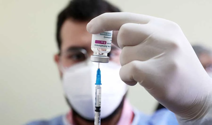 A Lebanese health worker prepares a shot of the Covid-19 AstraZeneca vaccine in Beirut on March 29, 2021. (AFP)