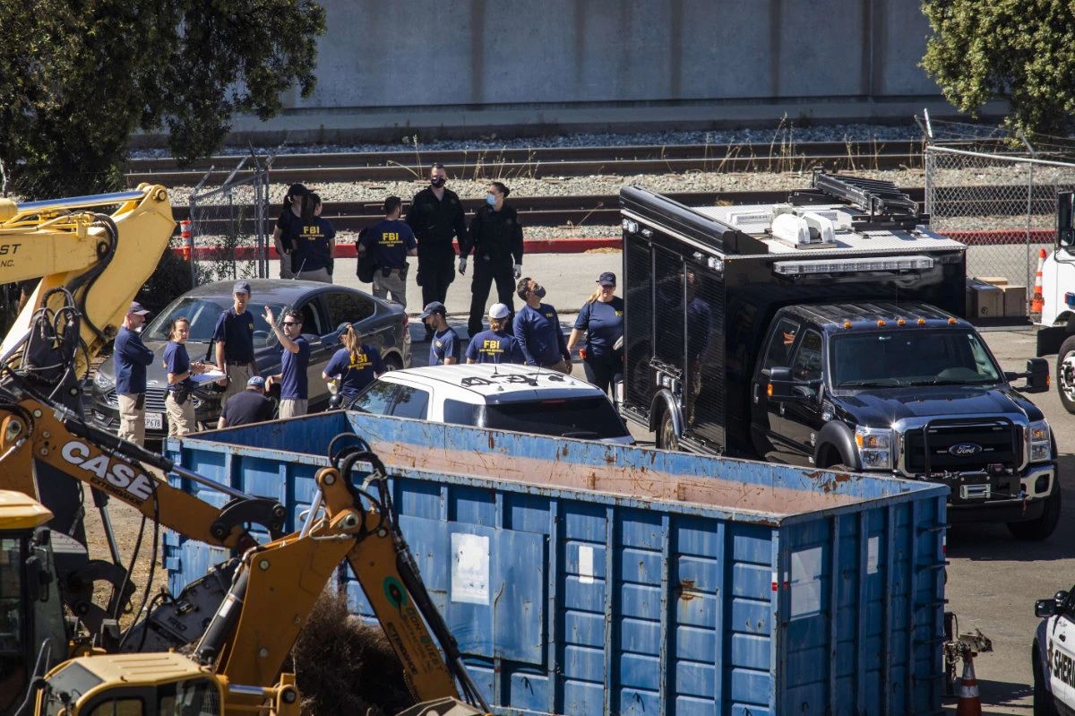 Investigators work the scene of a mass shooting at the Valley Transportation Authority light-rail yard on May 26, 2021 in San Jose, California. (Philip Pacheco/Getty Images/AFP)