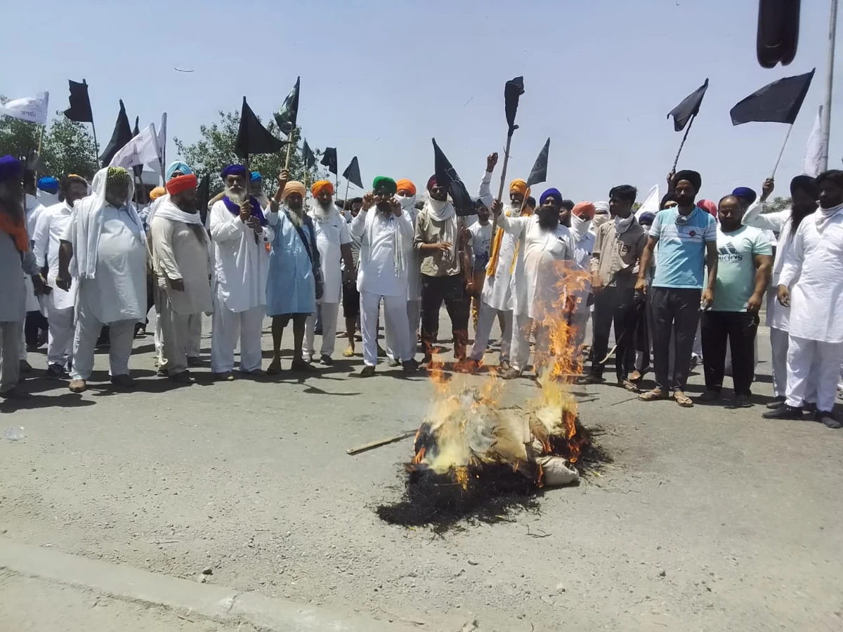 Indian farmers observe ‘black day’ in fight over new agricultural laws