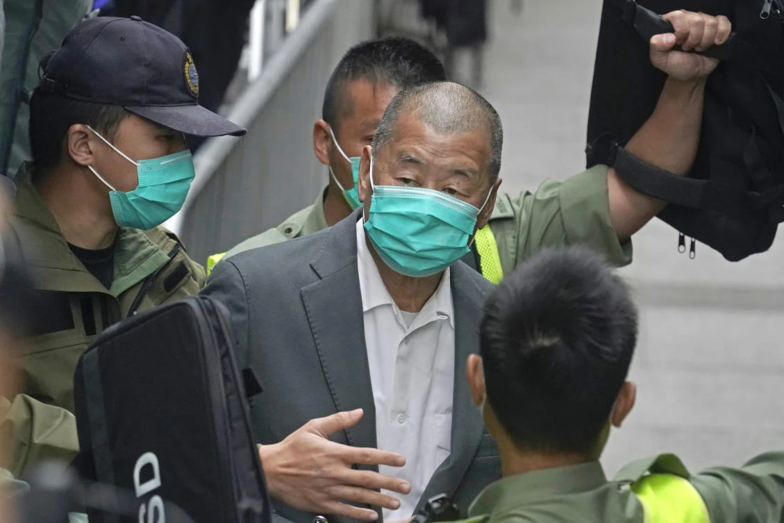 Media tycoon Jimmy Lai was among eight democracy activists handed new prison sentences. (AP)