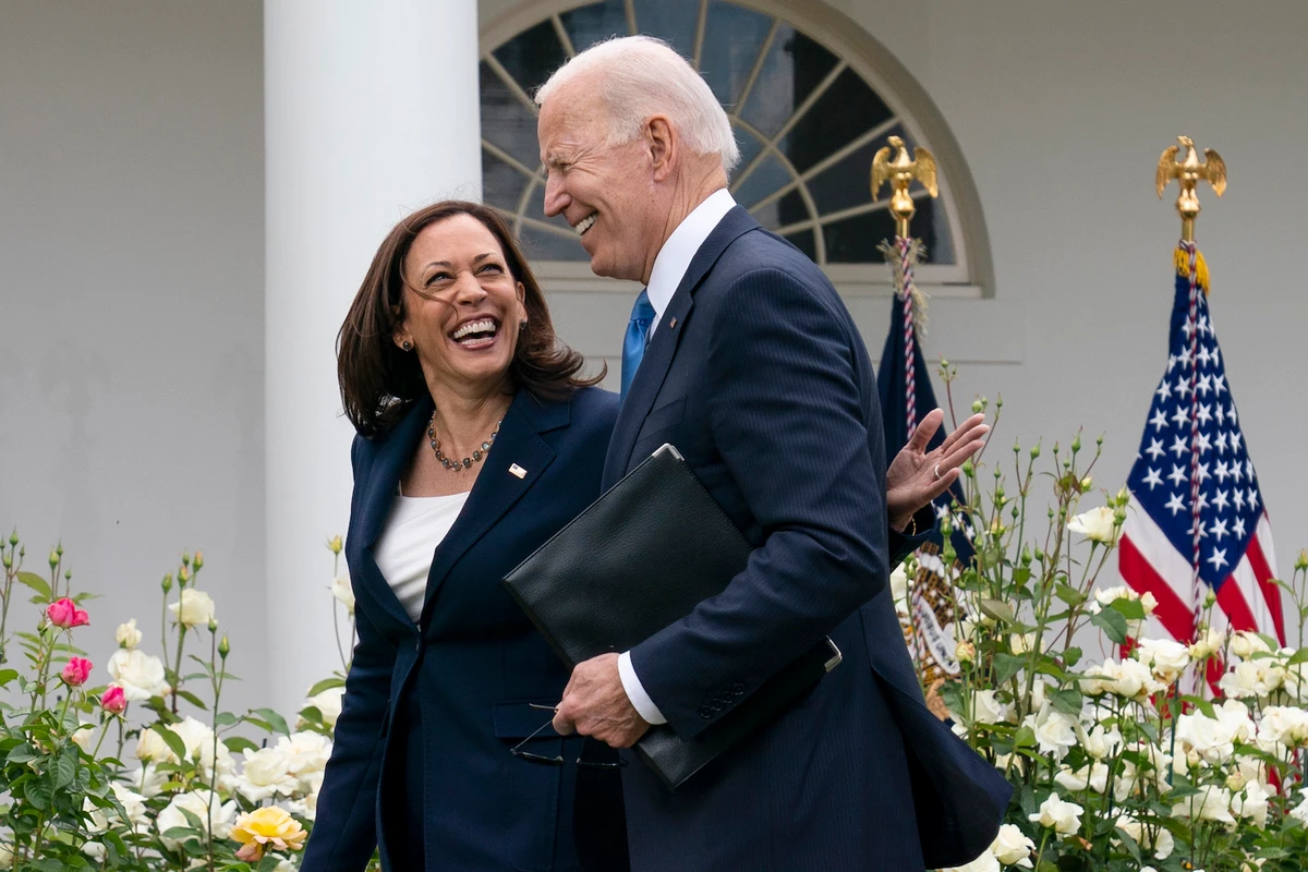 Vice President Kamala Harris and President Joe Biden walk off after speaking about updated guidance on mask mandates. (File/AP)