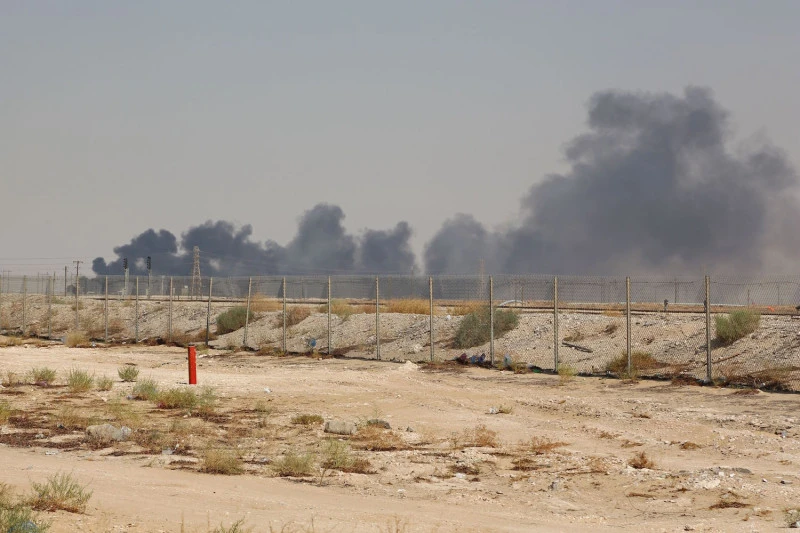 Smoke billows from Aramco’s facility in Abqaiq after a drone attack claimed by Houthi militants on Sept. 14, 2019. (AFP)