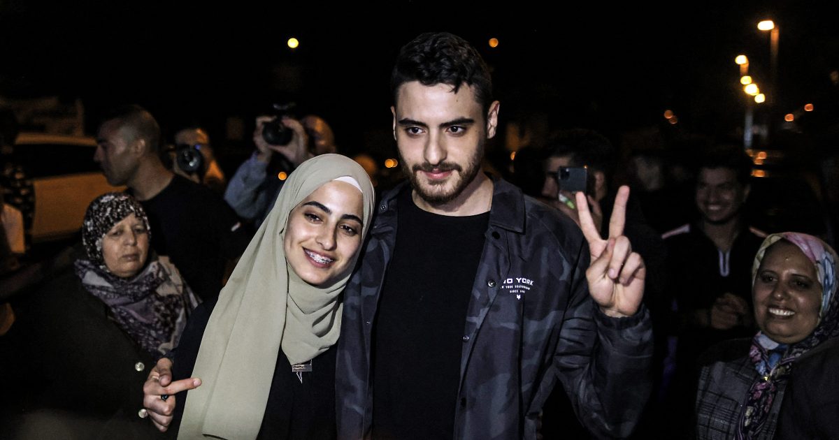 Muna and Mohammad Al-Kurd after being released by Israeli authorities in East Jerusalem’s Sheikh Jarrah neighbourhood. (AFP)