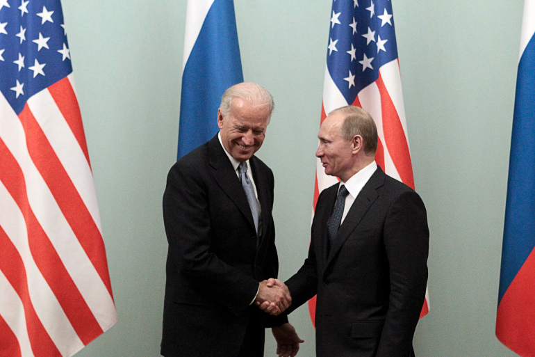 Russian Prime Minister Vladimir Putin shakes hands with U.S. Vice President Joe Biden during their meeting in Moscow, March 10, 2011. (Reuters)