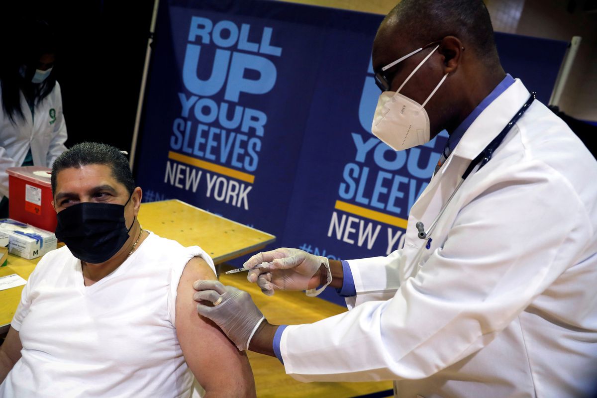 Eugenio Brito, VP of Bodegas of America, receives a Pfizer vaccination shot amid the COVID-19 pandemic, New York, U.S., Apr. 23, 2021. (Reuters)