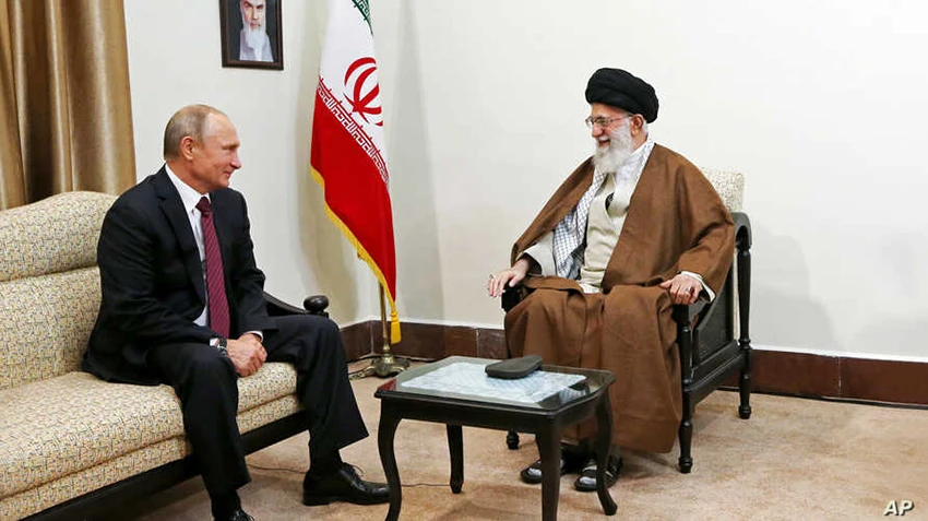 Iran's Supreme Leader Ayatollah Ali Khamenei, right, speaks with Russian President Vladimir Putin during their meeting in Tehran, Iran. (AP/File)