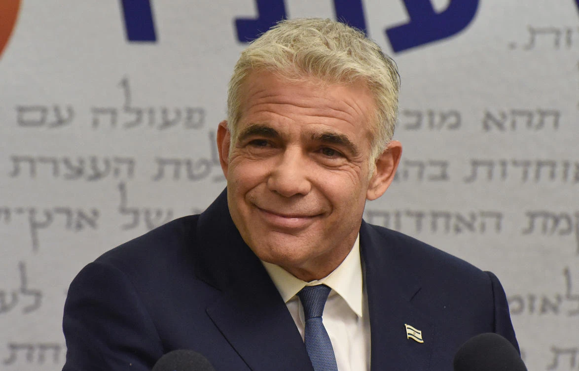 Israeli opposition leader Yair Lapid, a secular centrist, has been locked in talks with religious nationalist Naftali Bennett on the terms of a ‘change alliance.’ (File/AFP)