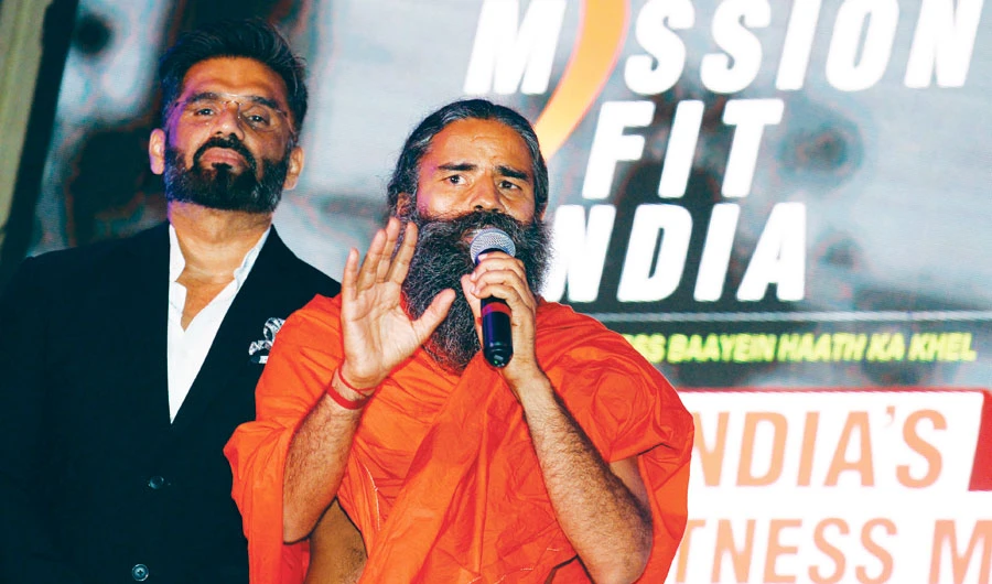 The popular guru Swami Ramdev blamed medical practitioners for India’s growing death toll amid a deadly second wave of COVID-19 in the country. (AFP)