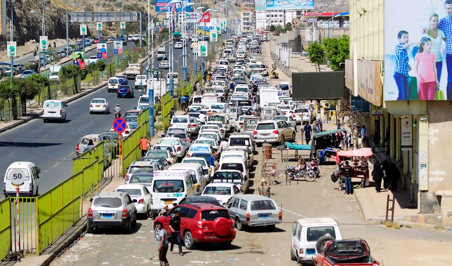 Drivers queue to fill their cars at a petrol station in Yemen's capital Sanaa, on February 24, 2021. (AFP)