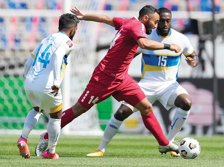 Lebanon’s Nader Matar dribbles the ball against Sri Lanka during their Asian zone Group H qualifying match for the FIFA World Cup in South Korea. (AP)