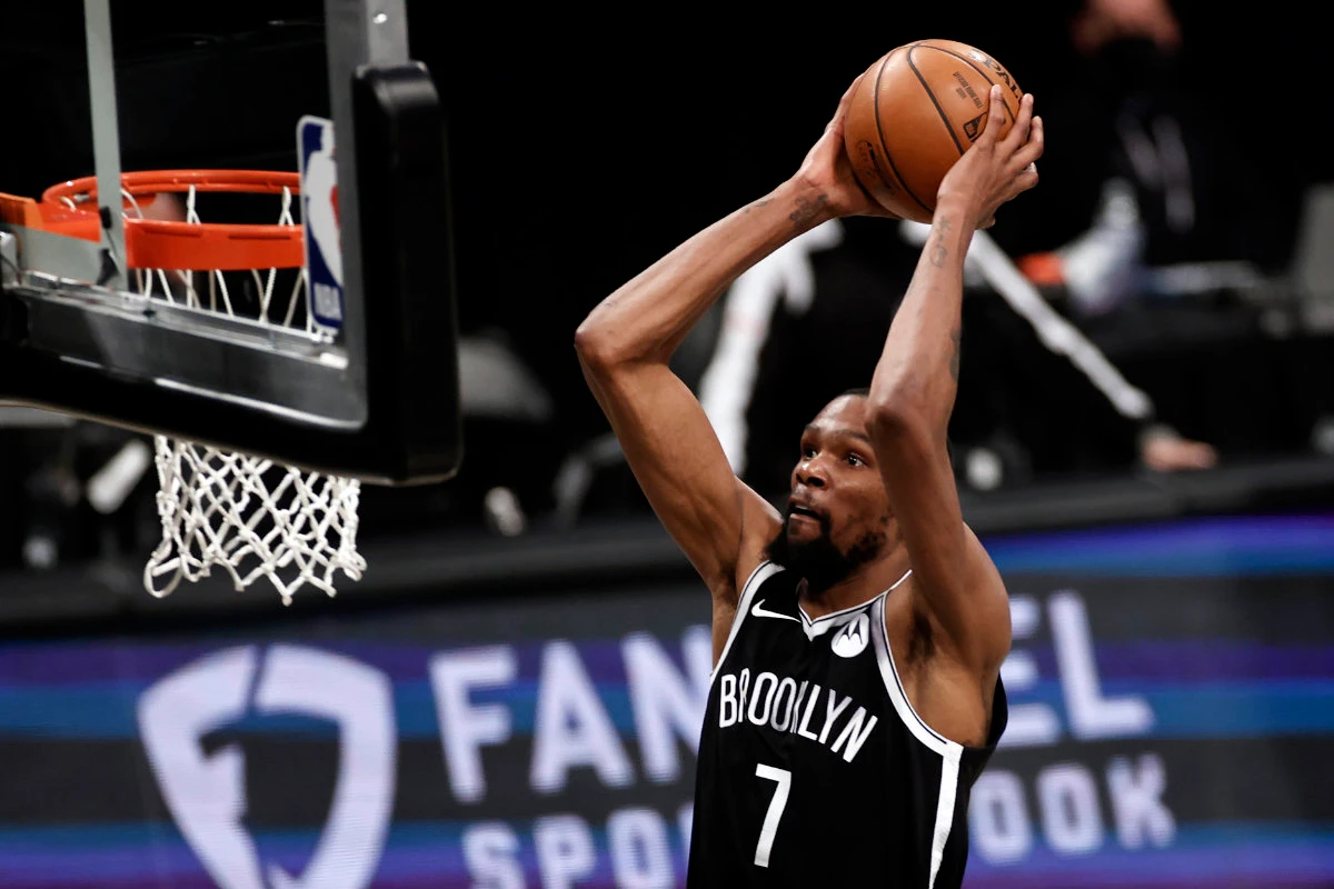 Brooklyn Nets forward Kevin Durant dunks against the Milwaukee Bucks during Game 1 of their NBA basketball second-round playoff series on June 5, 2021, in New York. (AP Photo/Adam Hunger)