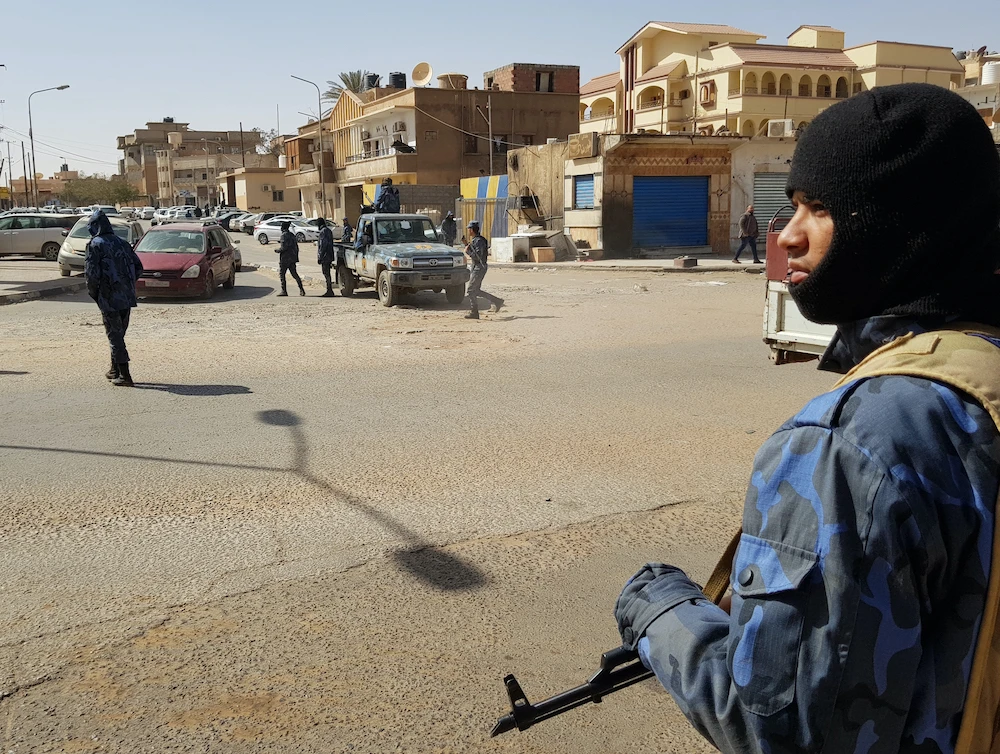 Forces loyal to Libyan strongman Khalifa Haftar patrol in the southern Libyan city of Sebha. (File/AFP)