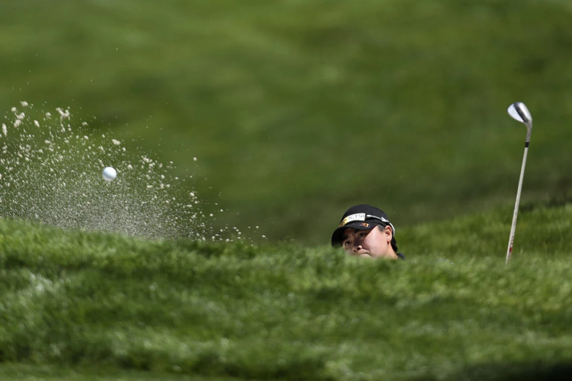 Yuka Saso of the Philippines hits from the bunker on the 17th green during the final round of the US Women's Open golf tournament on June 6, 2021, in San Francisco. (AP Photo/Jed Jacobsohn)