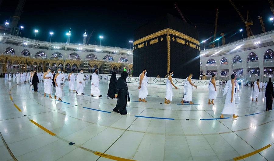 A handout picture provided by the Saudi Ministry of Hajj and Umrah on October 4, 2020, shows people circumambulating the Kaaba (Tawaf) in the Grand Mosque complex in the holy city of Makkah, Saudi Arabia. (AFP/ File)