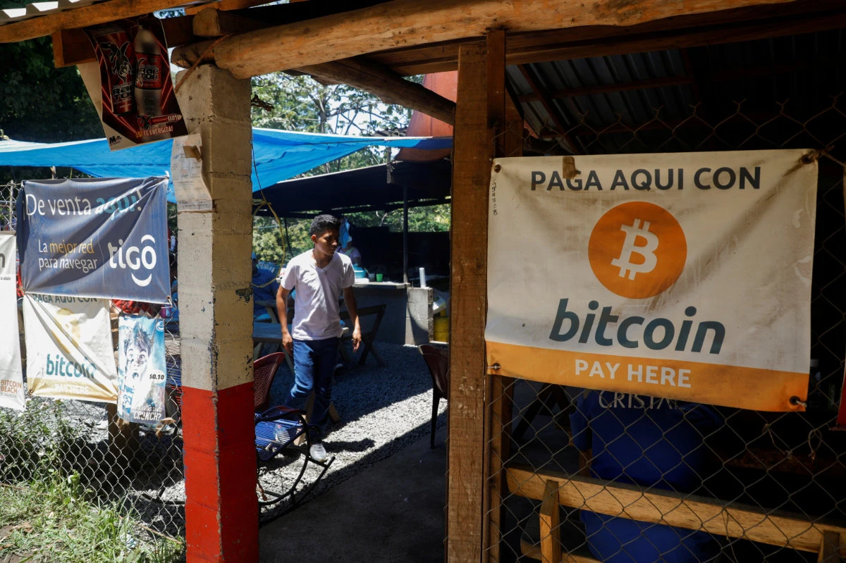 Bitcoin banners are seen outside of a small restaurant at El Zonte Beach in Chiltiupan, El Salvador on June 8, 2021. (REUTERS/Jose Cabezas)