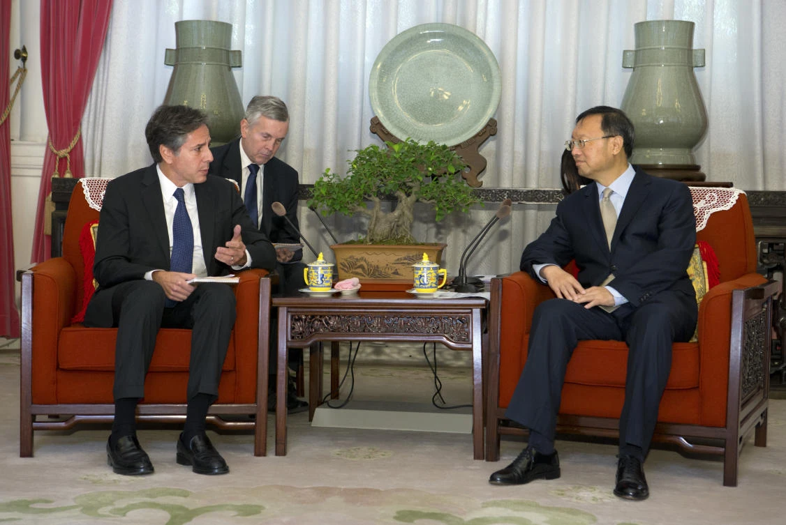 Then-US Deputy Secretary of State Antony Blinken, left, speaks with Chinese State Councilor Yang Jiechi in Beijing, China in this Oct. 8, 2015 photo. (AP)