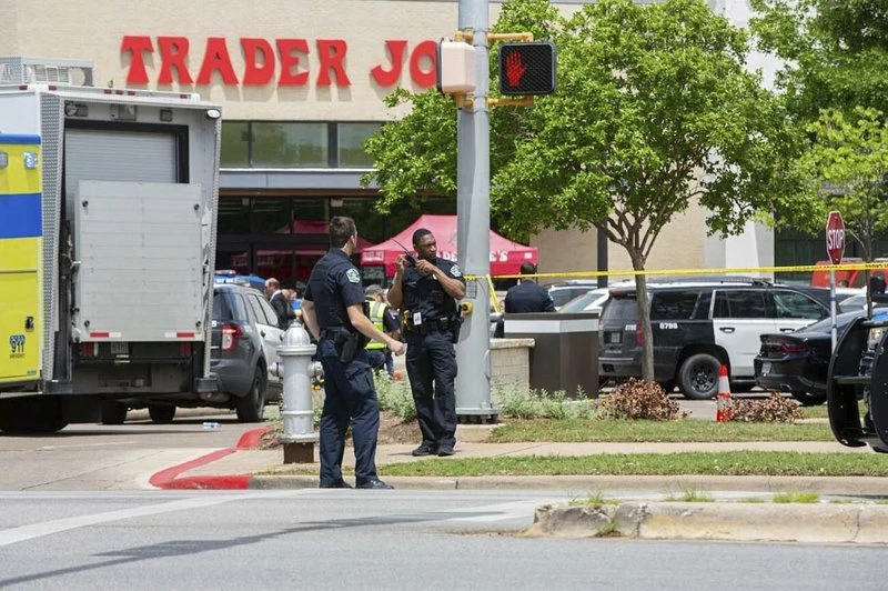 Police, SWAT and medical personnel respond to a fatal shooting in the Arboretum area of northwest Austin on Sunday, April 18, 2021. (AP)