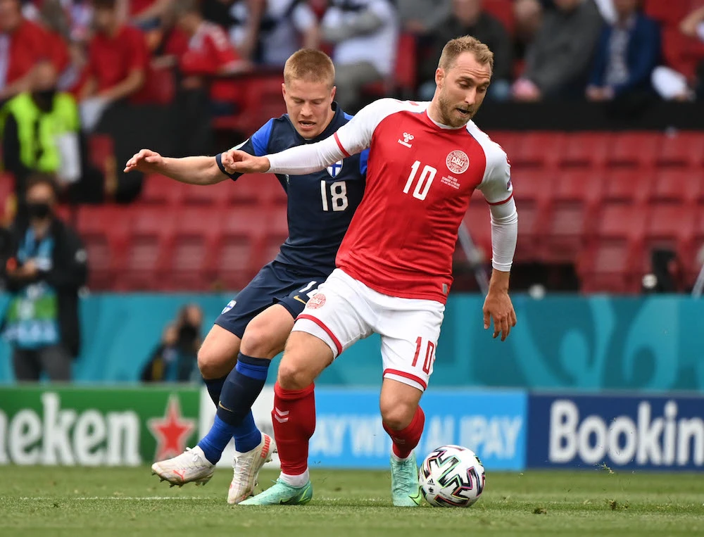 Denmark's Christian Eriksen (R) in action with Finland's Jere Uronen. (Reuters)