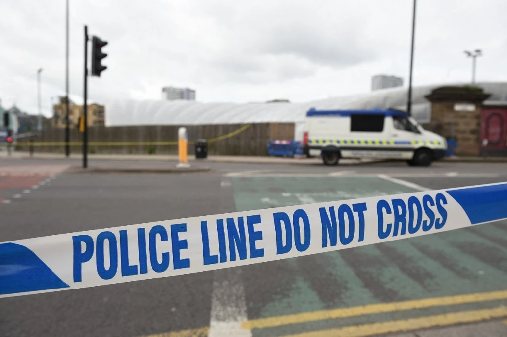 Above, a police cordon surrounds Manchester Arena in Manchester, northwest England following the deadly terror attacks on May 23, 2017. (AFP file photo)