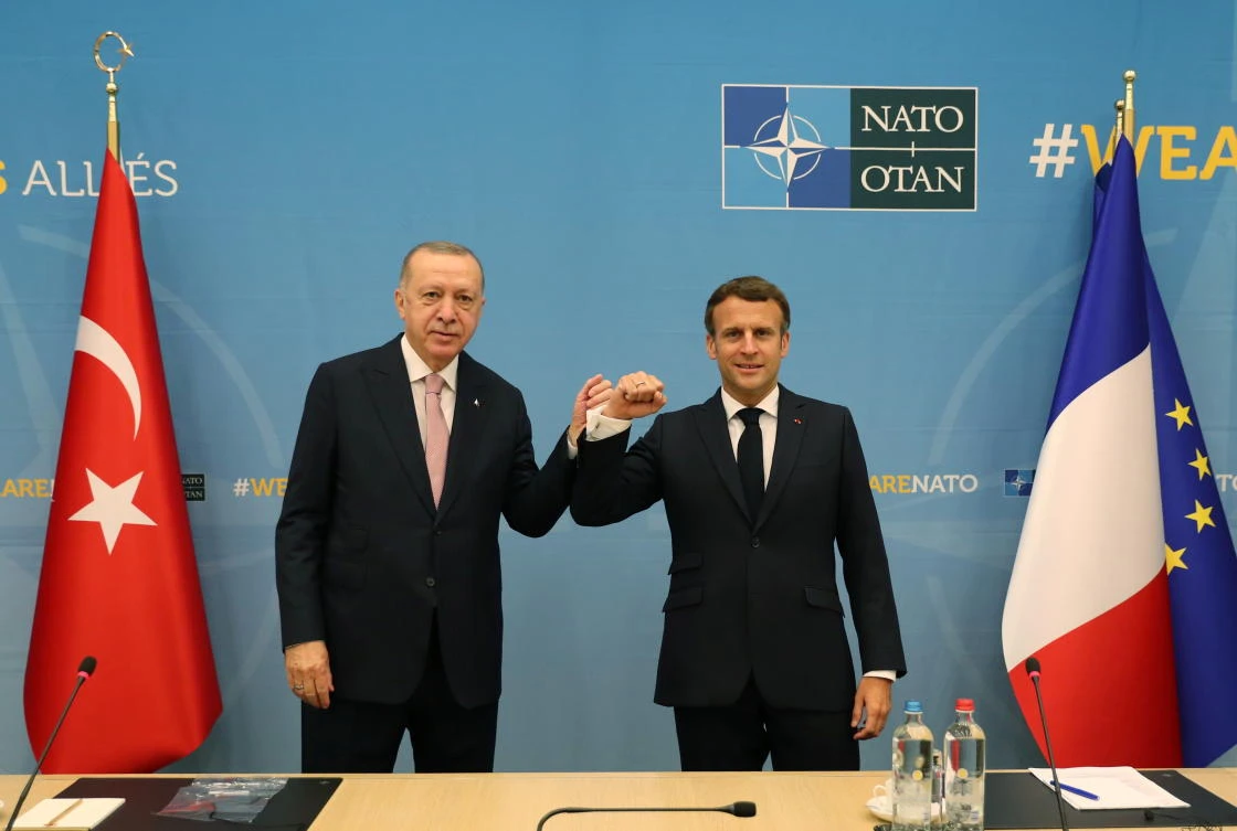 Turkish President Tayyip Erdogan meets with his French counterpart Emmanuel Macron on the sidelines of the NATO summit. (Reuters)