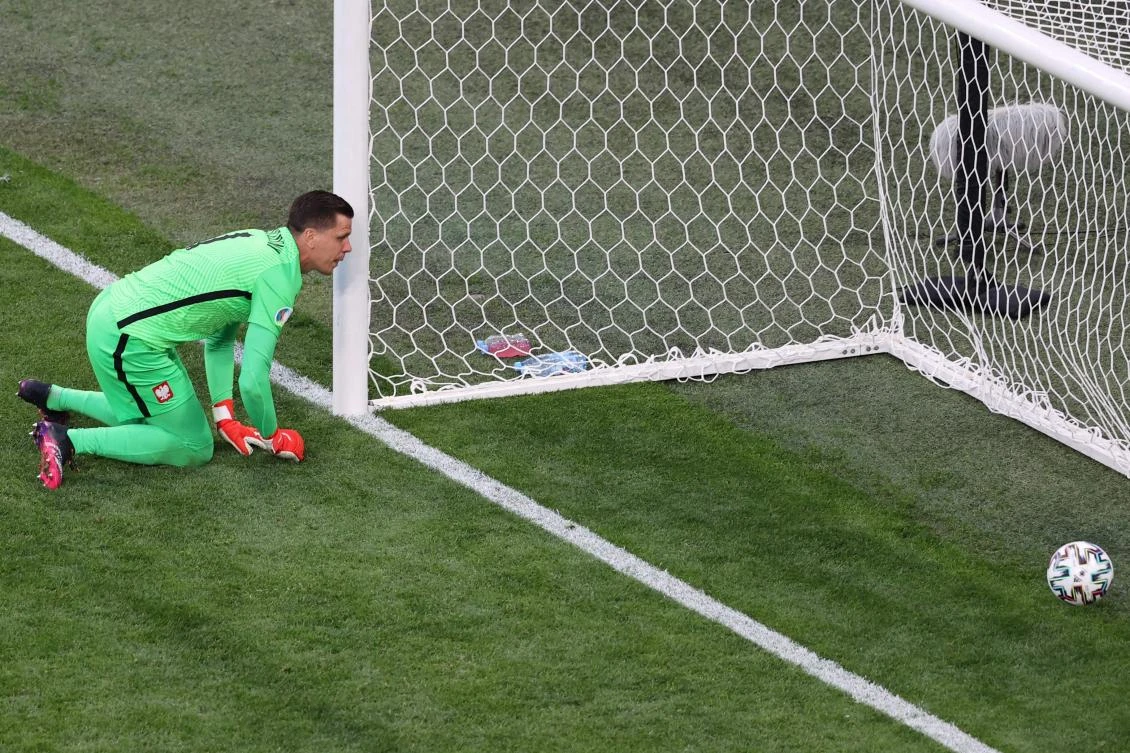 Poland's goalkeeper Wojciech Szczesny concedes a goal scored by Slovakia's defender Milan Skriniar during the UEFA EURO 2020 Group E match at Saint Petersburg Stadium. (AFP)