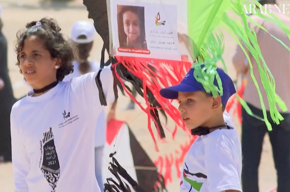 Gaza children fly kites with portraits of kids killed in last conflict with Israel