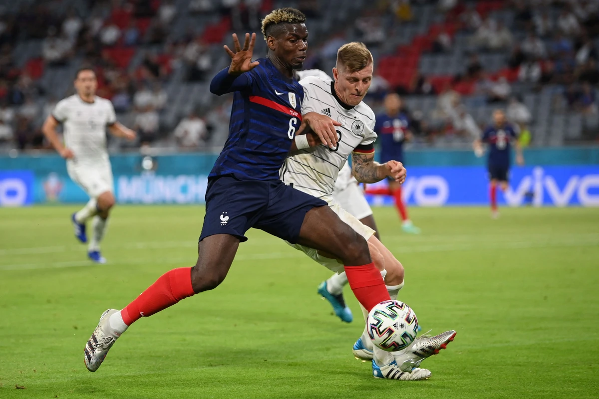 France’s Paul Pogba vies for the ball with Germany’s Toni Kroos during the UEFA EURO 2020 Group F football match between France and Germany at the Allianz Arena in Munich on June 15, 2021. (AFP)