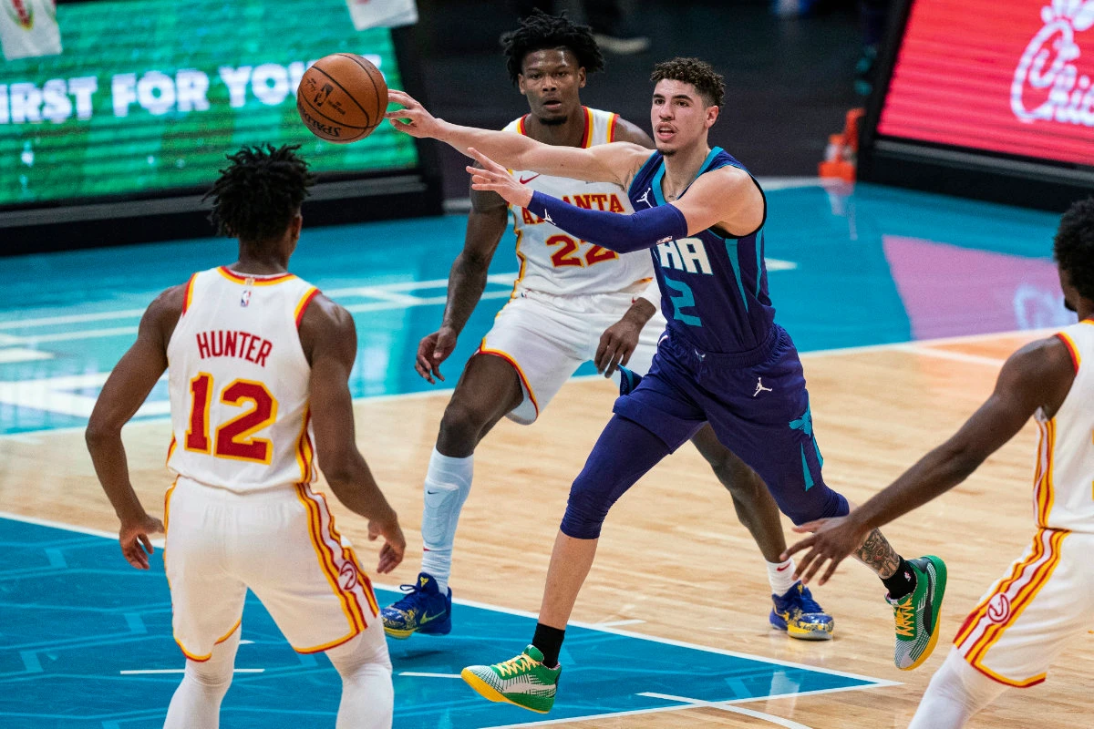 Charlotte Hornets guard LaMelo Ball's versatility as a passer, scorer and rebounder earned him NBA Rookie of the Year honors despite his missing 21 games with a fractured wrist. (AP Photo)